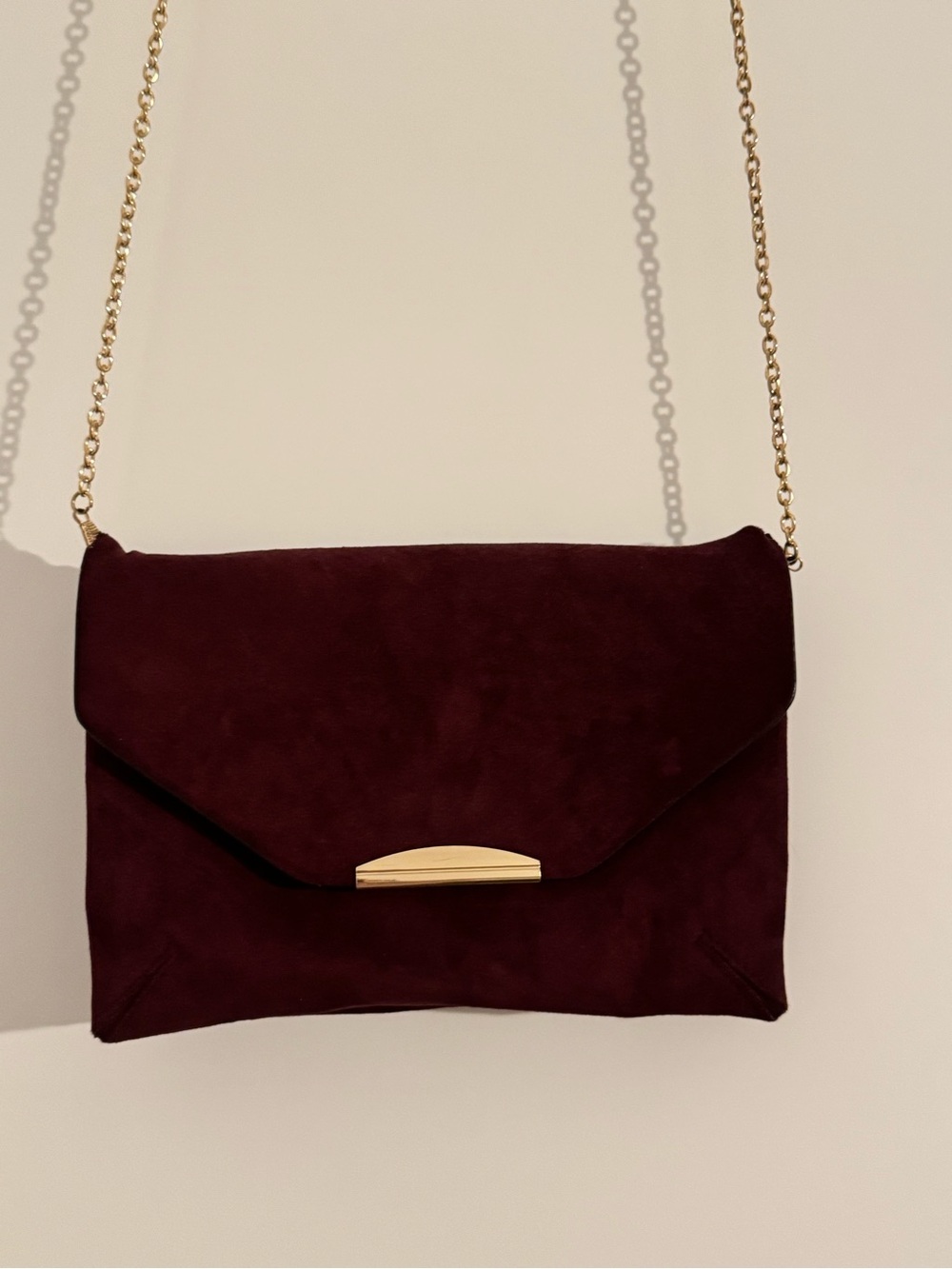 Le Chateau burgundy velvet clutch